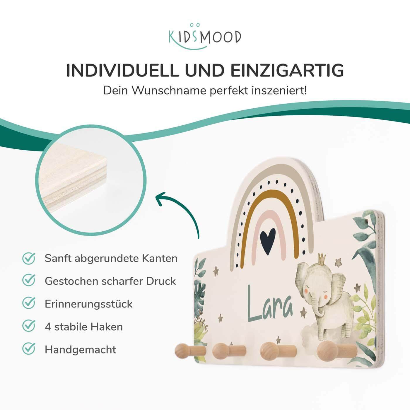 detail of the elephant design on wooden coat rack