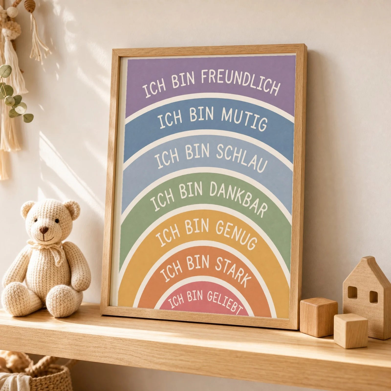Affirmationsposter Kinderzimmer Regenbogen Ich bin freundlich, als Wandbild über der Spielecke