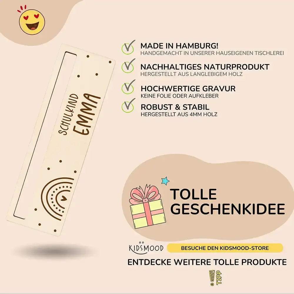 detailansicht der gravur auf der lesehilfe mit regenbogen