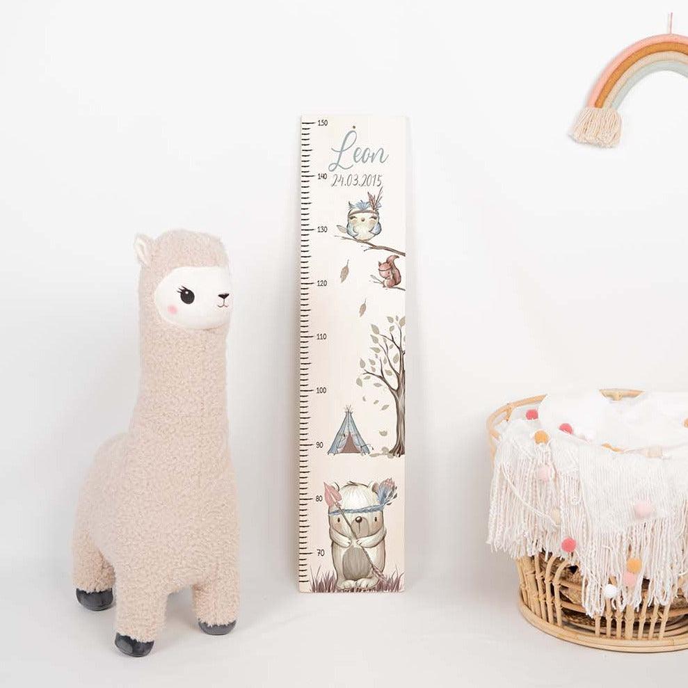 handcrafted growth chart with woodland bear engraving