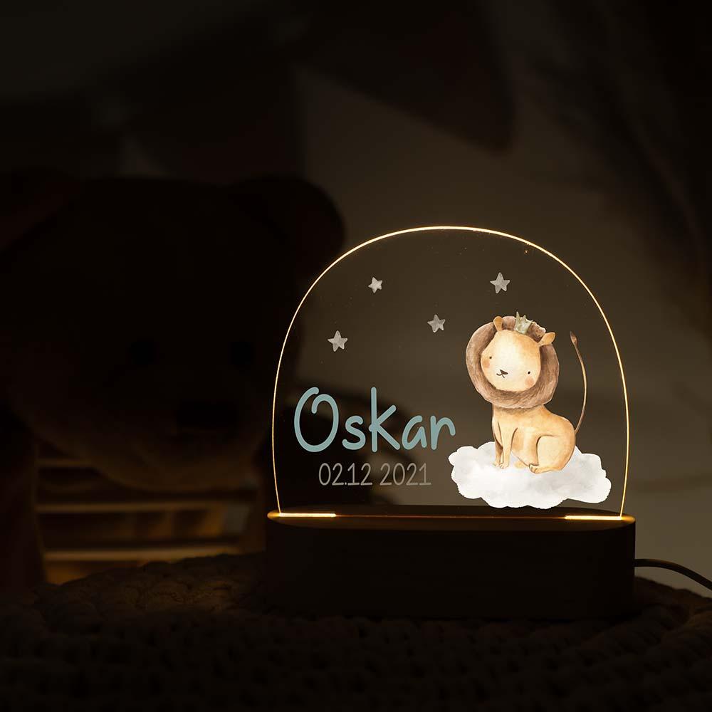 handcrafted night lamp with baby löwe, crown, stars engraving